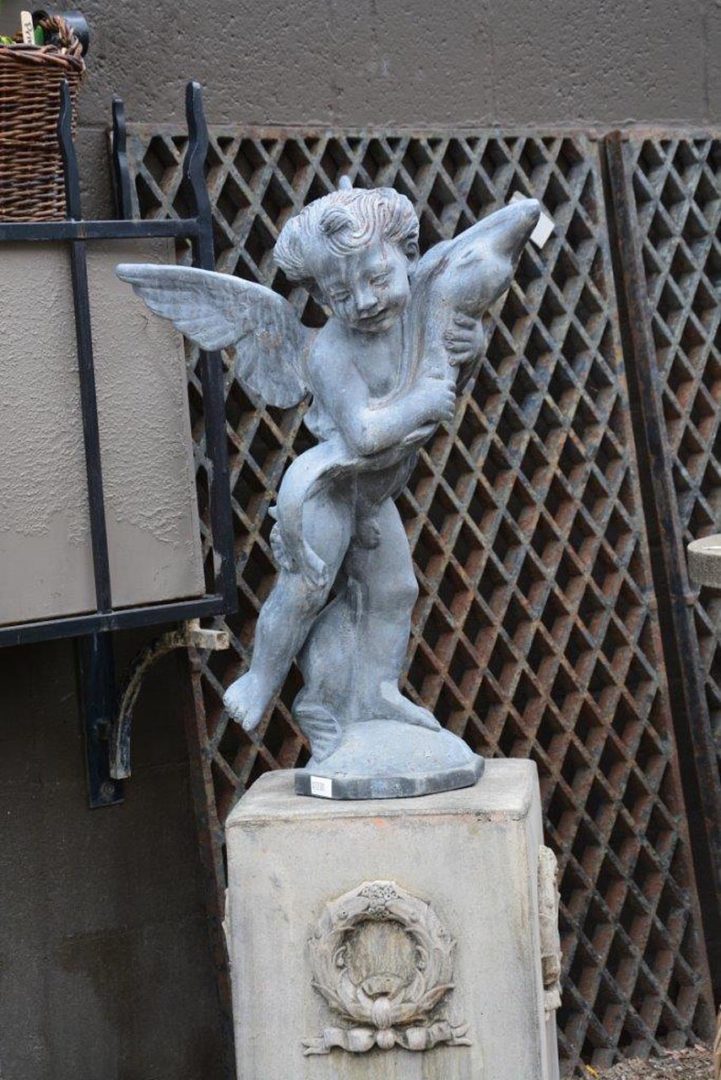 Lead Winged Putti Holding a Fish