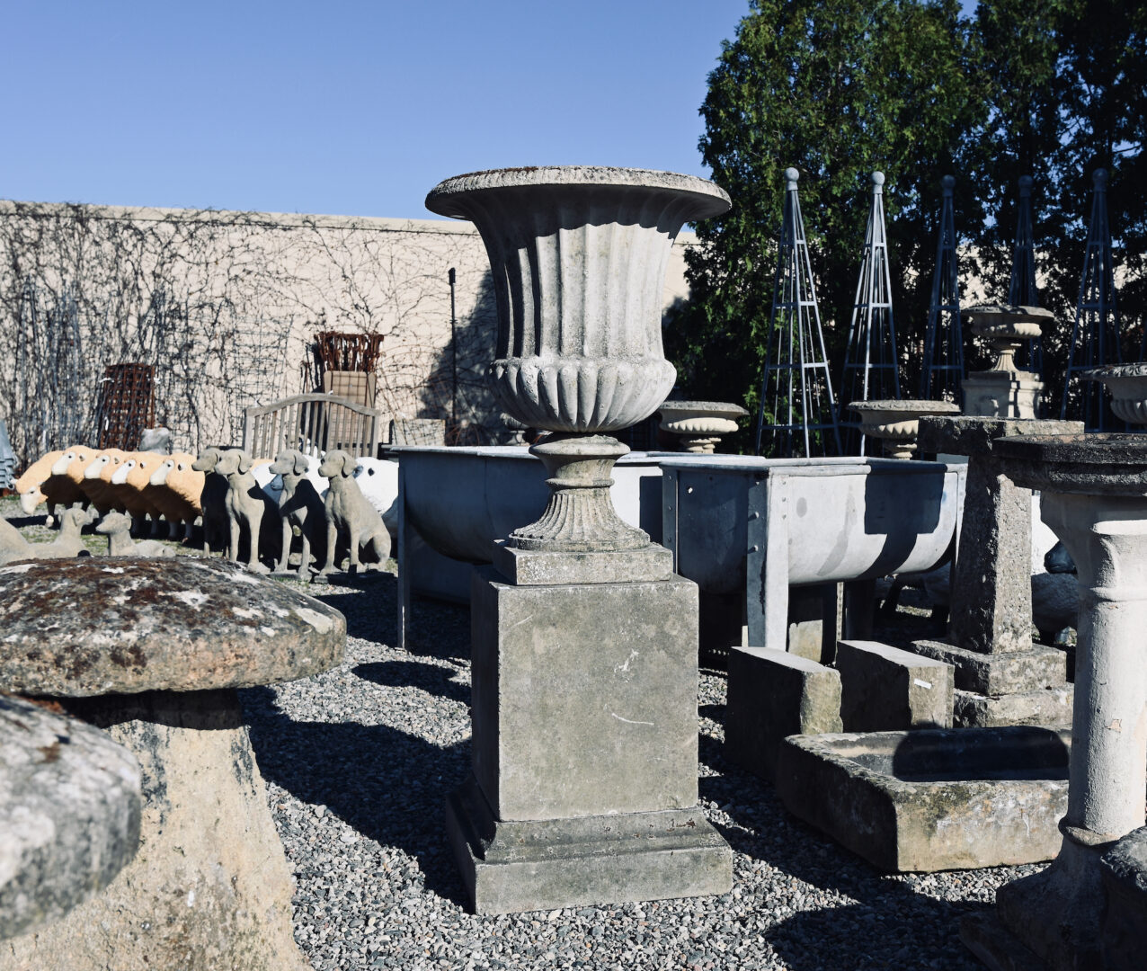 Large Weathered Urn on Plinth