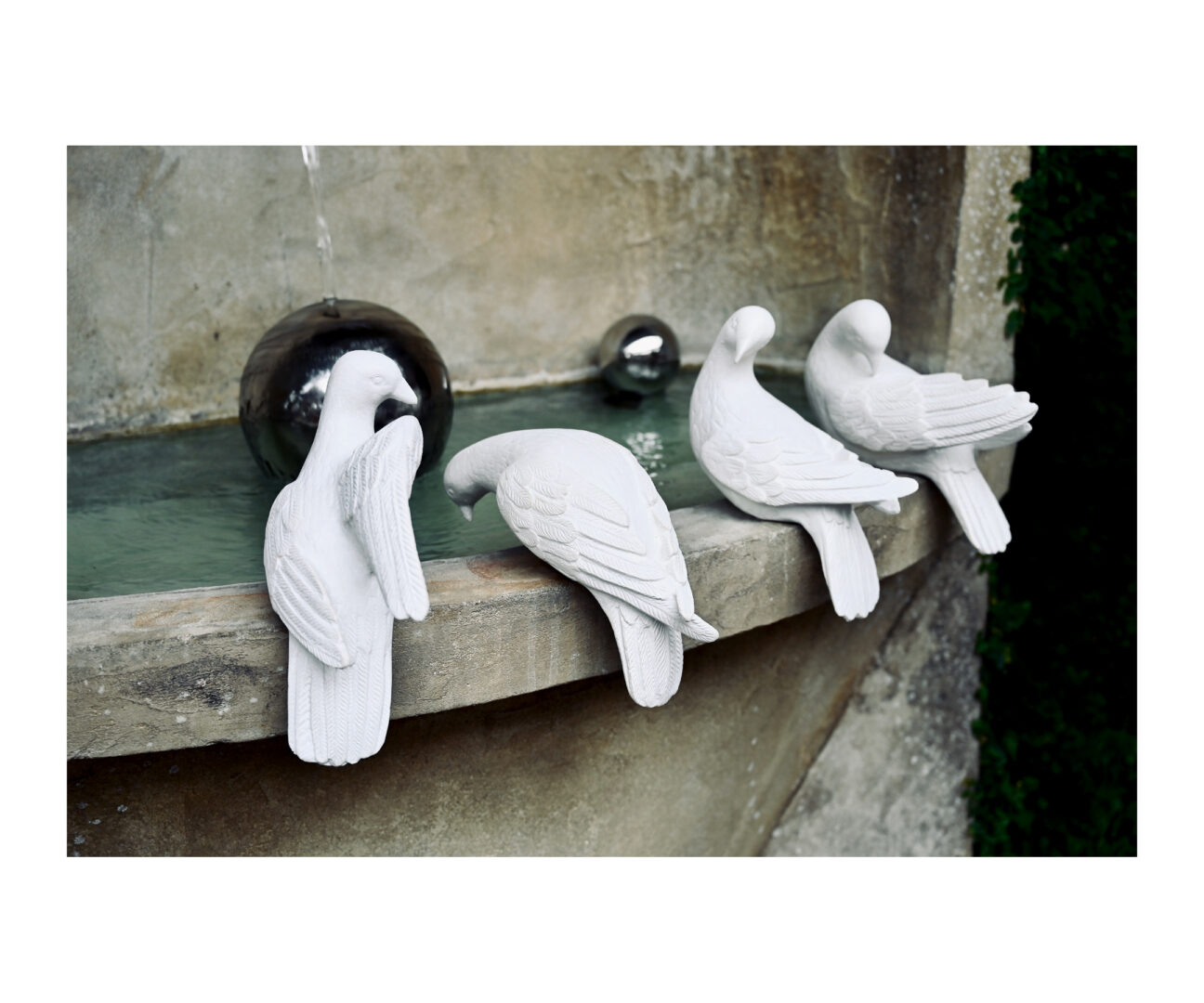 Four English Dove Sculptures
