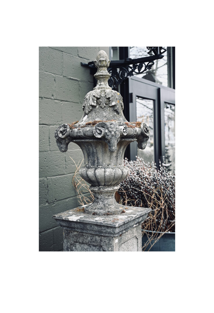 Weathered Finial Urn on Base