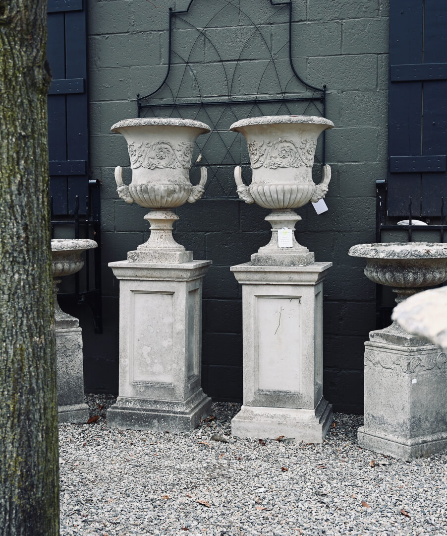 Pair of Large Urns with Pedestals