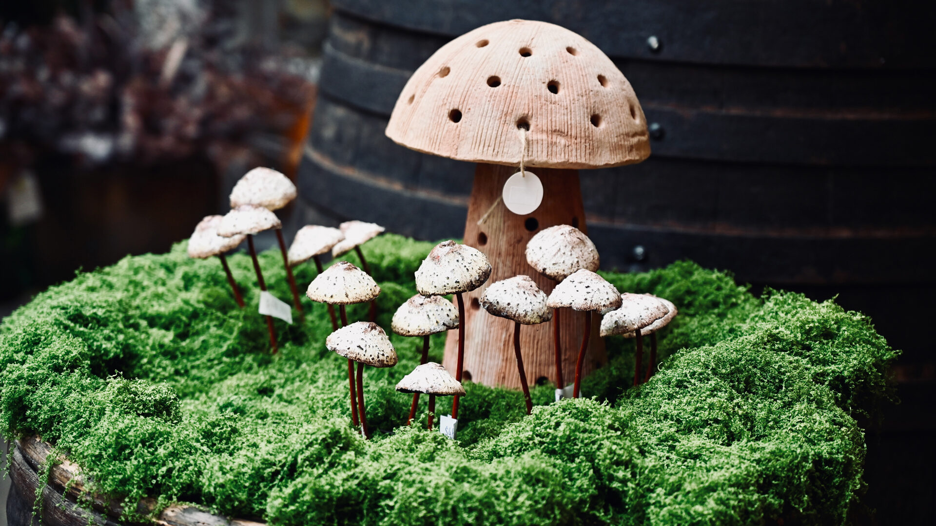 Mushroom Lantern & Mushroom Sculptures on a Faux Moss Blanket - Detroit Garden Works