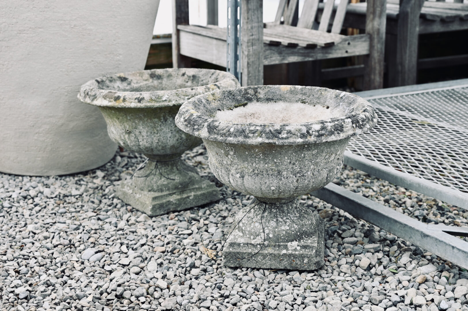 Pair of Weathered Urns