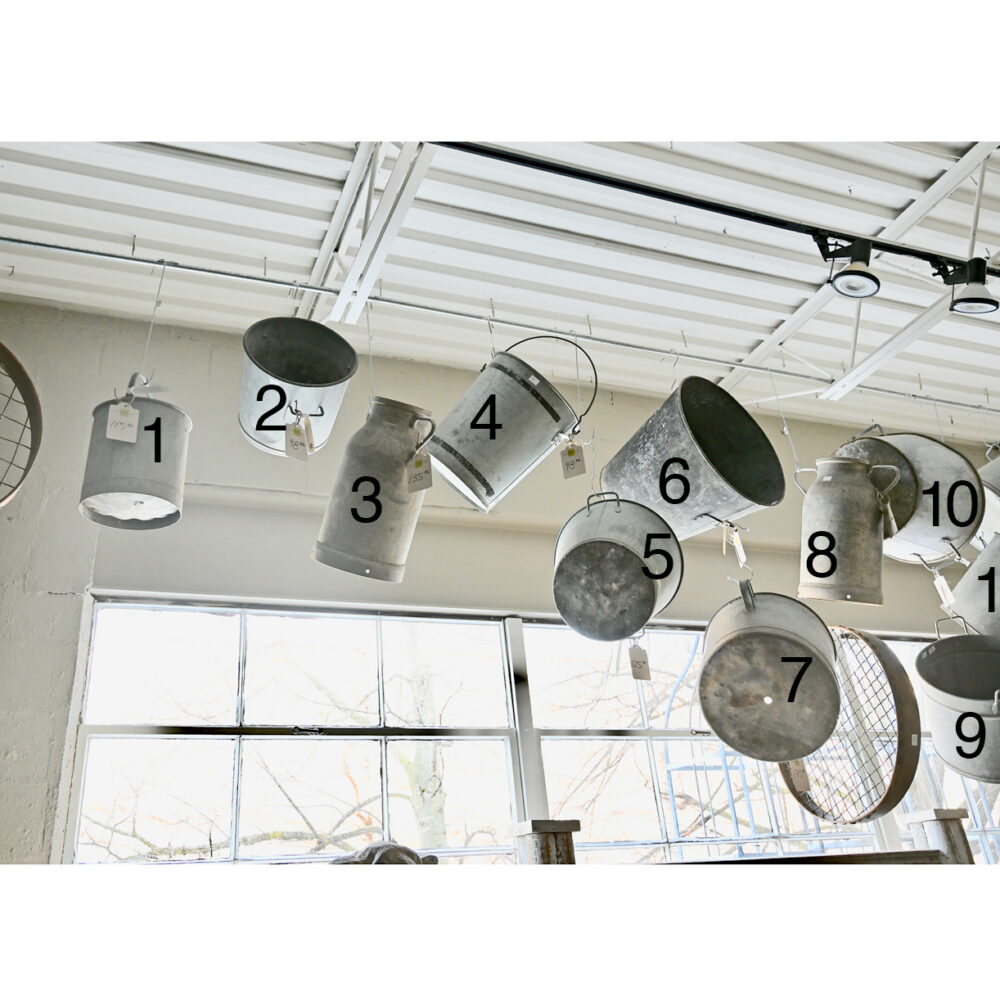 Grouping of Galvanized Containers with Riddles