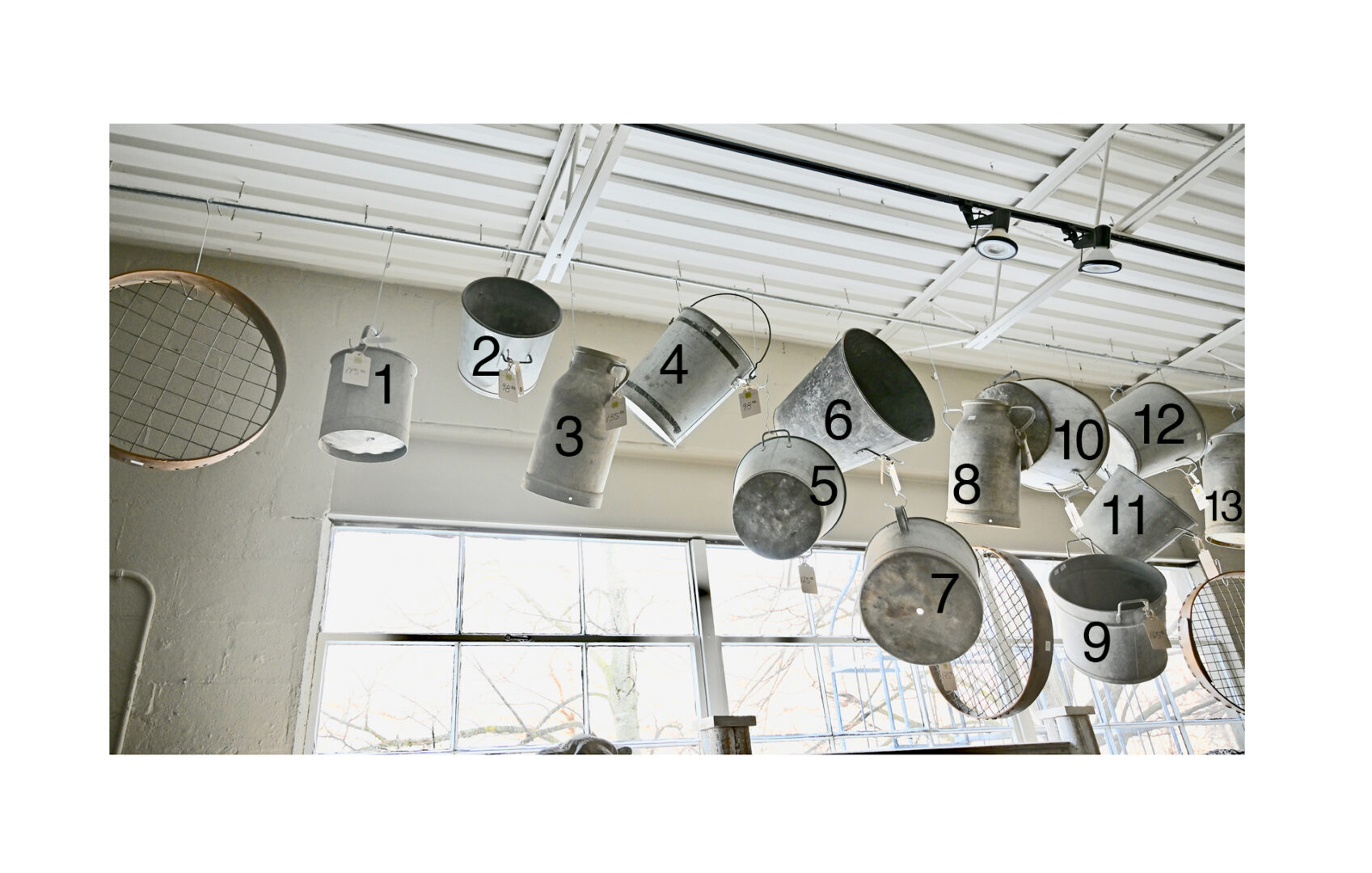 Grouping of Galvanized Containers with Riddles