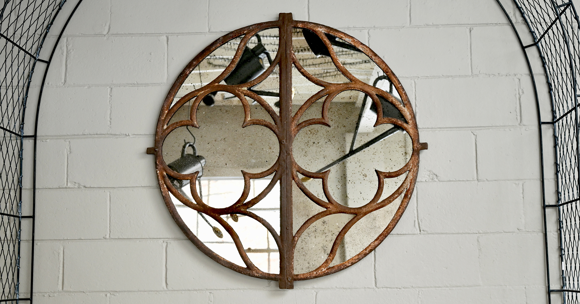 Shop: Circular Cast Iron Window with Modern Mirror | Detroit Garden Works