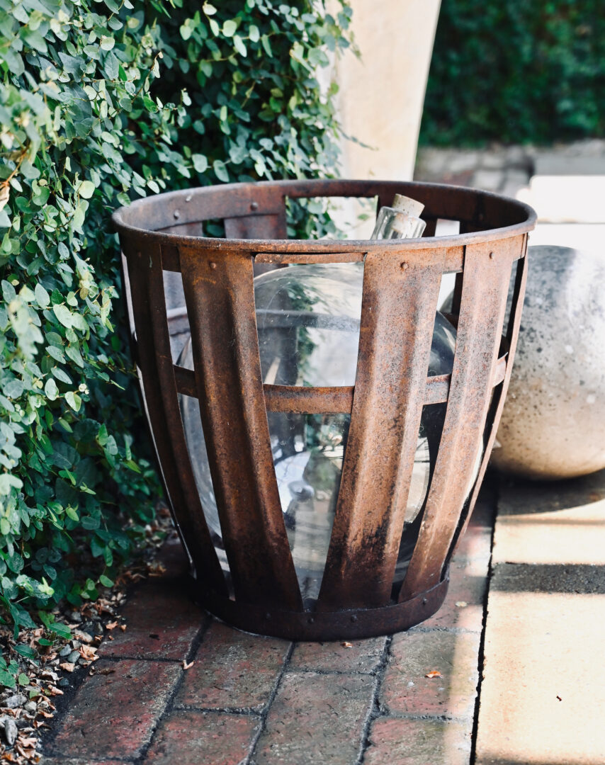 Demijohn in Metal Basket